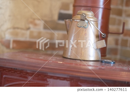 Kettle on the stove Kettle on the stove 140277611