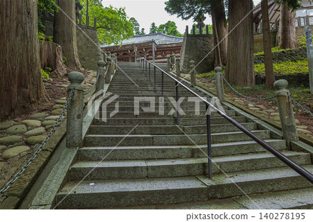 View of the main hall from the stone steps leading to Zenpoji Temple in Yamagata. View of the main hall from the stone steps leading to Zenpoji Temple in Yamagata. 140278195
