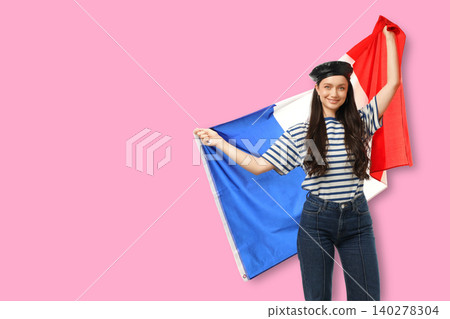 Woman joyfully holds flag representing French culture. Travel and adventure concept Woman joyfully holds flag representing French culture. Travel and adventure concept 140278304