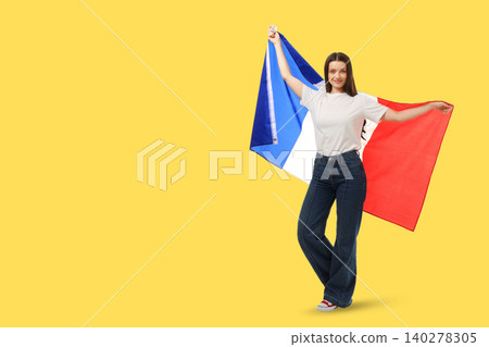 Woman holds French flag proudly Woman holds French flag proudly 140278305