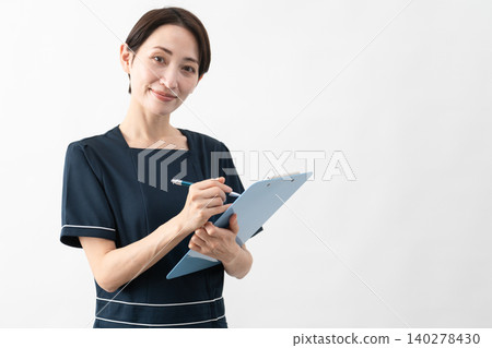 Young woman wearing beauty salon uniform Beauty image 140278430