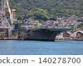 The destroyer "Kaga" is undergoing modifications while docked in Kure Port. 140278700
