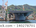 The destroyer "Kaga" is undergoing modifications while docked in Kure Port. 140278701