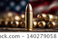 Bullet cartridge standing against american flag background 140279058