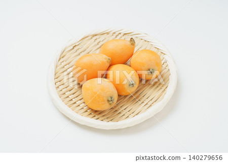 Loquats on a sieve Loquats on a sieve 140279656