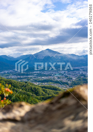 Cloud-covered mountain ranges and cities Cloud-covered mountain ranges and cities 140279868