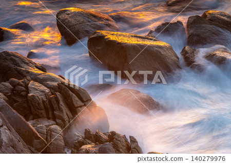 Rocky reefs shining in the setting sun: Yakushima, where gods reside (Autumn) Rocky reefs shining in the setting sun: Yakushima, where gods reside (Autumn) 140279976