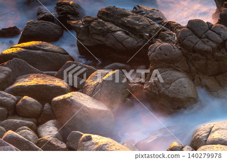 Rocky reefs shining in the setting sun: Yakushima, where gods reside (Autumn) Rocky reefs shining in the setting sun: Yakushima, where gods reside (Autumn) 140279978
