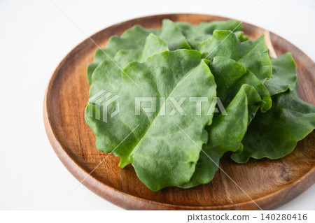 Okinawa spinach served on a wooden plate Okinawa spinach served on a wooden plate 140280416