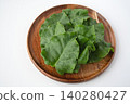 Okinawa spinach served on a wooden plate 140280427