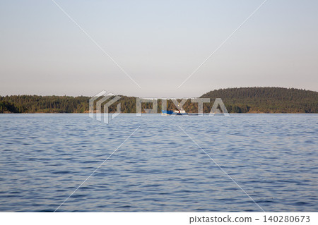 Landscape with a small ship at Lake Landscape with a small ship at Lake 140280673