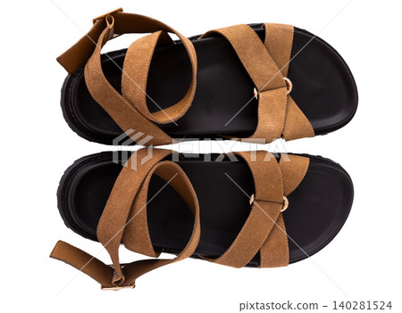 Stylish Brown Suede Summer Sandals isolated on white background, Comfortable Casual Flat Platform Strappy Shoes top view 140281524