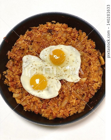 Bokkeumbap, a Korean fried rice dish, often made with kimchi or other vegetables, meats, and seasoned with savory spices. A comforting and flavorful meal! Bokkeumbap, a Korean fried rice dish, often made with kimchi or other vegetables, meats, and seasoned with savory spices. A comforting and flavorful meal! 140281633
