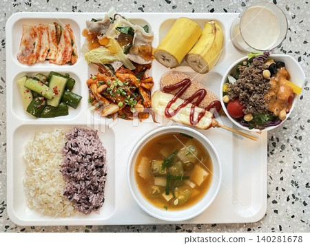 A vibrant spread of Korean food on the table, featuring various banchan (side dishes) like kimchi, pickled vegetables, and seasoned greens. Perfect for food photography, showcasing traditional Korean. A vibrant spread of Korean food on the table, featuring various banchan (side dishes) like kimchi, pickled vegetables, and seasoned greens. Perfect for food photography, showcasing traditional Korean. 140281678