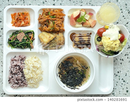 A vibrant spread of Korean food on the table, featuring various banchan (side dishes) like kimchi, pickled vegetables, and seasoned greens. Perfect for food photography, showcasing traditional Korean. A vibrant spread of Korean food on the table, featuring various banchan (side dishes) like kimchi, pickled vegetables, and seasoned greens. Perfect for food photography, showcasing traditional Korean. 140281691