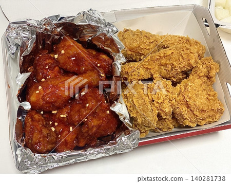 Crispy fried chicken with golden, crunchy skin and juicy, tender meat. A delicious and savory dish, perfect for any meal, served with dipping sauces or side dishes for extra flavor! 140281738