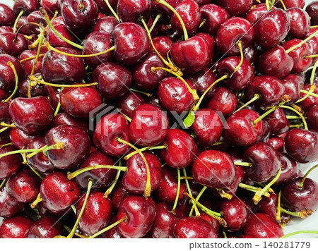Juicy, ripe cherries with vibrant red hues and a sweet, slightly tart flavor. Perfect as a refreshing snack or as an ingredient in desserts, bringing a burst of color and taste to any dish. Juicy, ripe cherries with vibrant red hues and a sweet, slightly tart flavor. Perfect as a refreshing snack or as an ingredient in desserts, bringing a burst of color and taste to any dish. 140281779