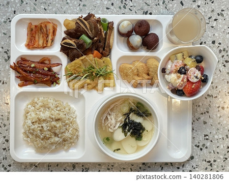 A vibrant spread of Korean food on the table, featuring various banchan (side dishes) like kimchi, pickled vegetables, and seasoned greens. Perfect for food photography, showcasing traditional Korean. A vibrant spread of Korean food on the table, featuring various banchan (side dishes) like kimchi, pickled vegetables, and seasoned greens. Perfect for food photography, showcasing traditional Korean. 140281806