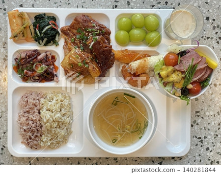 A vibrant spread of Korean food on the table, featuring various banchan (side dishes) like kimchi, pickled vegetables, and seasoned greens. Perfect for food photography, showcasing traditional Korean. A vibrant spread of Korean food on the table, featuring various banchan (side dishes) like kimchi, pickled vegetables, and seasoned greens. Perfect for food photography, showcasing traditional Korean. 140281844