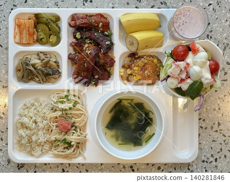 A vibrant spread of Korean food on the table, featuring various banchan (side dishes) like kimchi, pickled vegetables, and seasoned greens. Perfect for food photography, showcasing traditional Korean. A vibrant spread of Korean food on the table, featuring various banchan (side dishes) like kimchi, pickled vegetables, and seasoned greens. Perfect for food photography, showcasing traditional Korean. 140281846