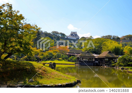 Hikone Castle castle tower seen from Genkyuen Garden Hikone Castle castle tower seen from Genkyuen Garden 140281888