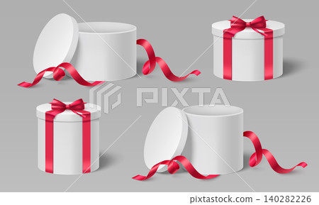 White cylindrical gift box with red ribbon bow White cylindrical gift box with red ribbon bow 140282226