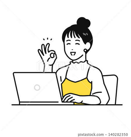 一位頭髮紮起來的年輕女子在電腦前比出「OK」手勢。 140282350