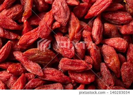 Close-up of organic dried goji berries texture background. Healthy food Close-up of organic dried goji berries texture background. Healthy food 140283034