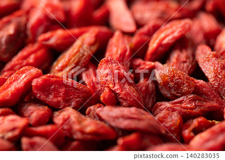 Close-up of organic dried goji berries texture background. Healthy food Close-up of organic dried goji berries texture background. Healthy food 140283035