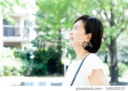 middle-aged women commuting to work middle-aged women commuting to work 140283115