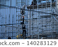 Large-scale renovation, painting work, temporary scaffolding assembly site. 140283129
