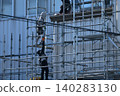 Large-scale renovation, painting work, temporary scaffolding assembly site. 140283130