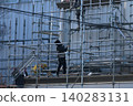 Large-scale renovation, painting work, temporary scaffolding assembly site. 140283131