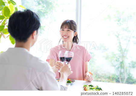 Drinking during the day, drinking at home, men and women drinking alcohol 140285072