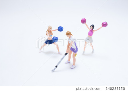 A Miniature hockey player teamwork concept A Miniature hockey player teamwork concept 140285150