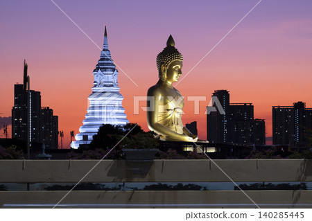 Golden Buddha Statue and Pagoda at Sunset in Bangkok, Thailand Golden Buddha Statue and Pagoda at Sunset in Bangkok, Thailand 140285445