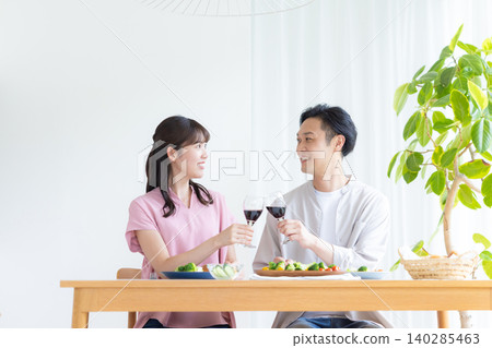 Drinking during the day, drinking at home, men and women drinking alcohol Drinking during the day, drinking at home, men and women drinking alcohol 140285463