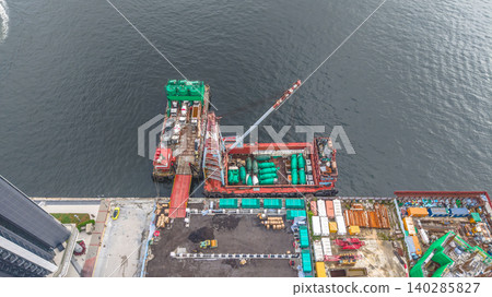 June 7 2026 Hong Kong. Yau Tong harbour construction barge June 7 2026 Hong Kong. Yau Tong harbour construction barge 140285827