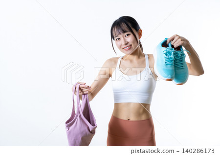 For stylish women who are in shape: Choosing the right clothes for yoga and training. For stylish women who are in shape: Choosing the right clothes for yoga and training. 140286173