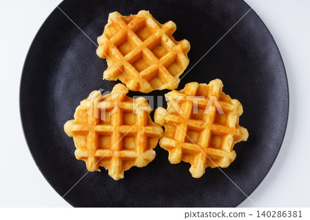 delicious belgian waffles delicious belgian waffles 140286381
