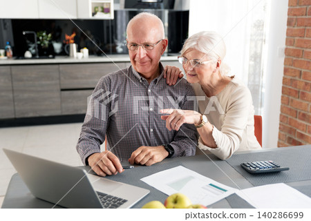Retirees using social media, browsing internet Retirees using social media, browsing internet 140286699