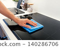 Hand cleaning induction stove 140286706