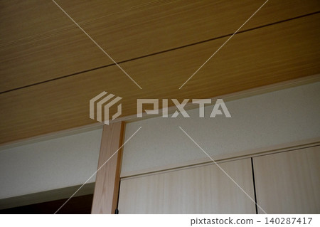 Traditional Japanese room with wood-grained ceiling, lintel, and wall beam (interior of a Japanese-style house) Traditional Japanese room with wood-grained ceiling, lintel, and wall beam (interior of a Japanese-style house) 140287417