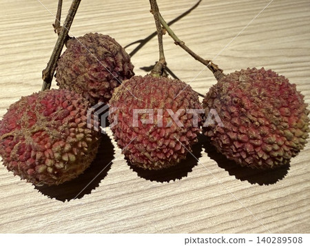 Freshly harvested raw lychees (2) 140289508