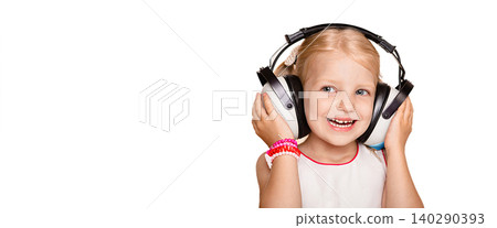 Positive little girl wearing special earphones getting a hearing test, audiometer hearing test. Isolated on white background Positive little girl wearing special earphones getting a hearing test, audiometer hearing test. Isolated on white background 140290393