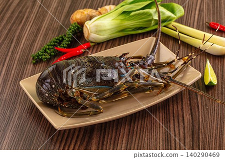 Raw Spiny Lobster On Plate With Fresh Asian Ingredients Raw Spiny Lobster On Plate With Fresh Asian Ingredients 140290469