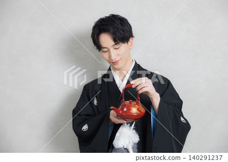 A young man in a hakama with family crest A young man in a hakama with family crest 140291237