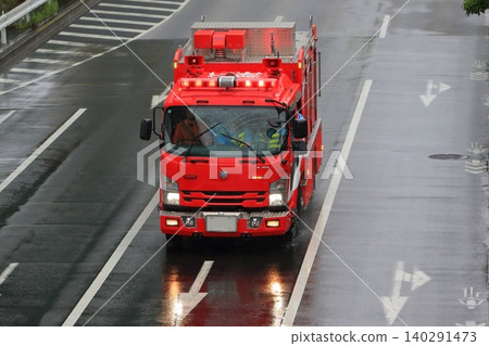 Image of a fire truck on an emergency run. Image of a fire truck on an emergency run. 140291473