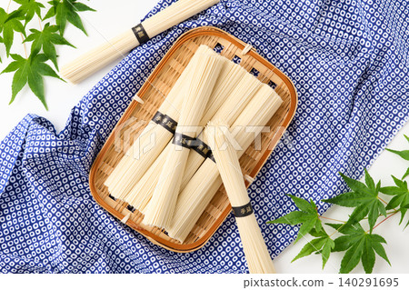 Hand-stretched somen noodles served on a bamboo sieve Hand-stretched somen noodles served on a bamboo sieve 140291695