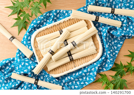 Hand-stretched somen noodles served on a bamboo sieve Hand-stretched somen noodles served on a bamboo sieve 140291700
